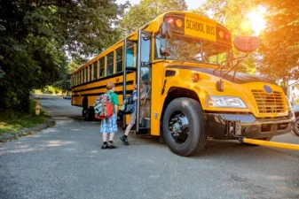 Discover Seminole County Public Schools with children getting on a school bus.jpg