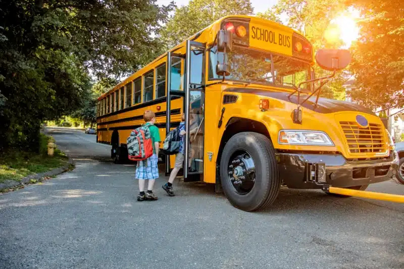Discover Seminole County Public Schools with children getting on a school bus.jpg